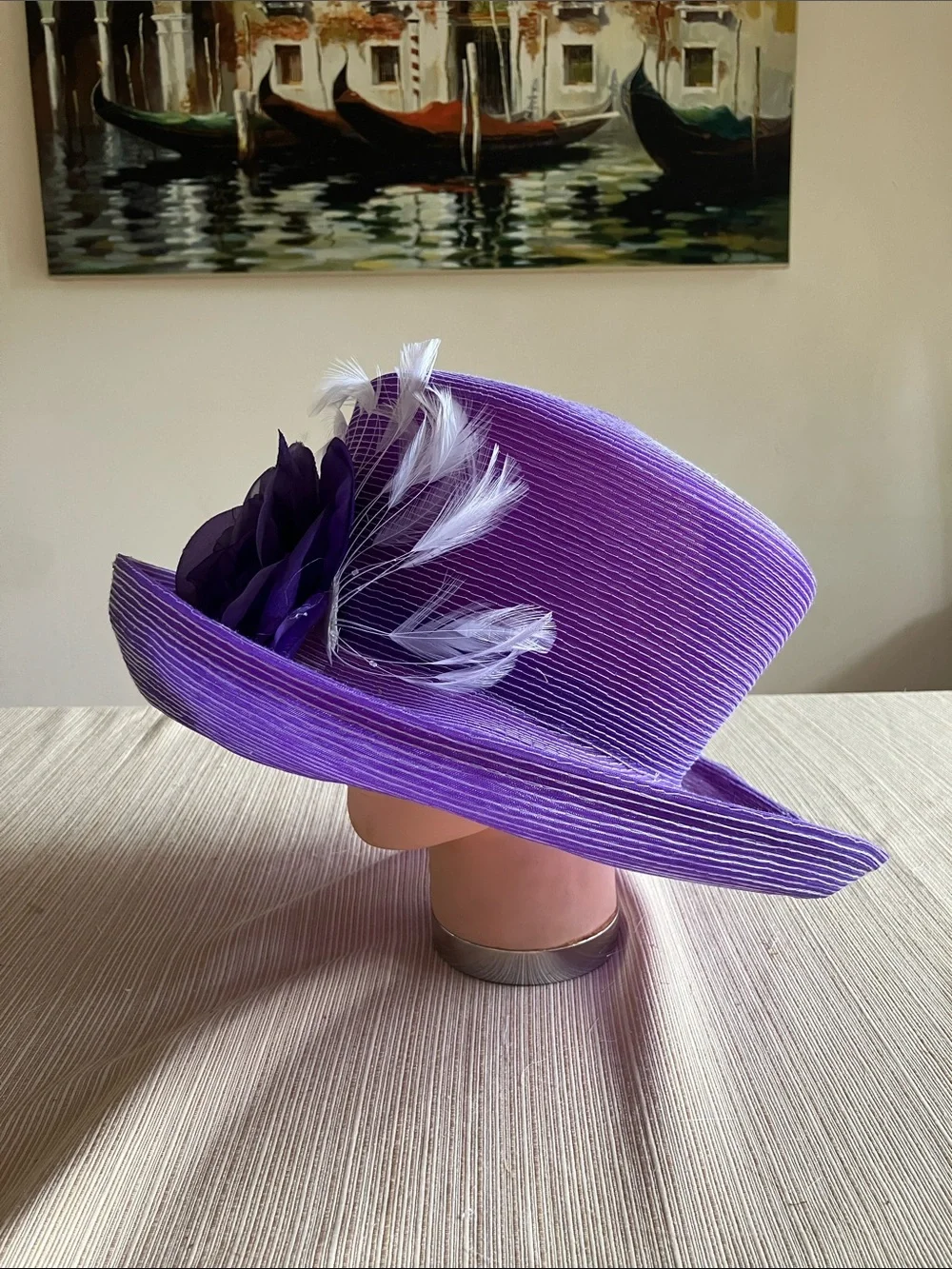 Elegant Purple Wide-Brim Floral Hat With White Feather Accents